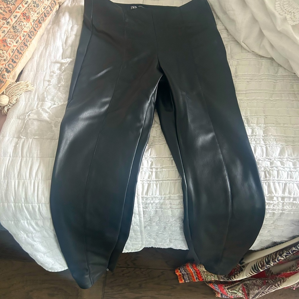 Pleather pants with zip up inner ankle.